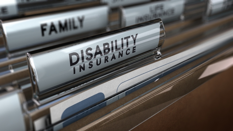 File tab labeled “Disability Insurance” in an office filing system